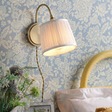 Laura Ashley Hemsley Wall Light Antique Brass and Ivory –  from Amos Lighting + Home