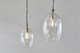 Nkuku Otoro Recycled Clear Glass Pendant  Large Oval –  from Amos Lighting + Home