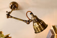 Nkuku Tubu Brass Extendable Wall Light Antique Brass Finish –  from Amos Lighting + Home